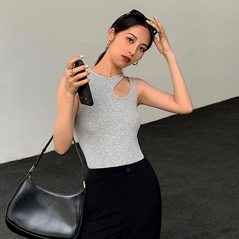 TWOTWINSTYLE Casual White Cut Out Women&#39;s T Shirt Round Neck Sleeveless Korean Slim T Shirts Female Clothing 2022 Summer Fashion